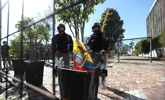Soldiers make a fence around the National Assembly in Quito, Ecuador, May 17, 2023.