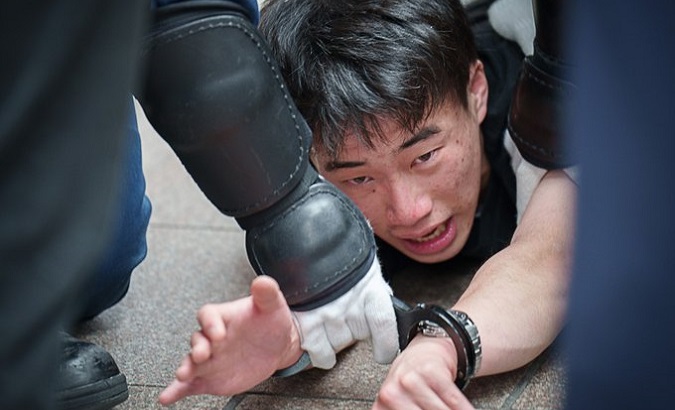 An anti-G7 protester in downtown Hiroshima, Japan, May, 2023.