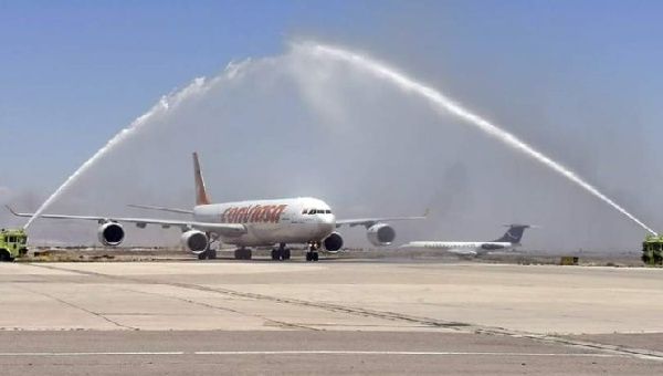 A CONVIASA plane is greeted with water jets in Damascus, Syria, May 31, 2023.