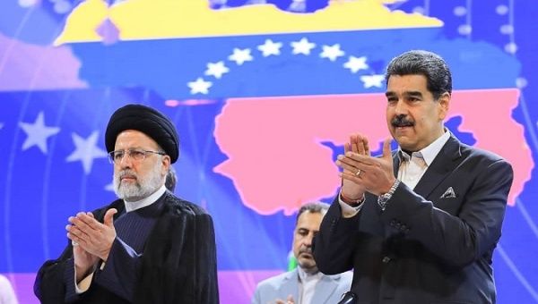 Iranian President Ebrahim Raisi (L) & Venezuelan President Nicolas Maduro (R), June 13, 2023.