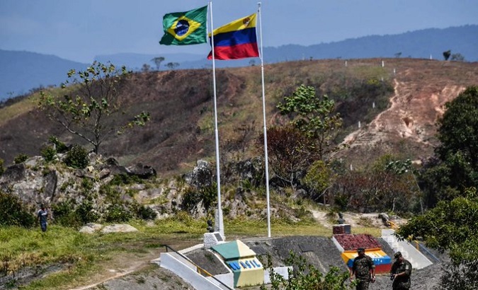 Flags of Brazil and Venezuela on a common border, June 2023.