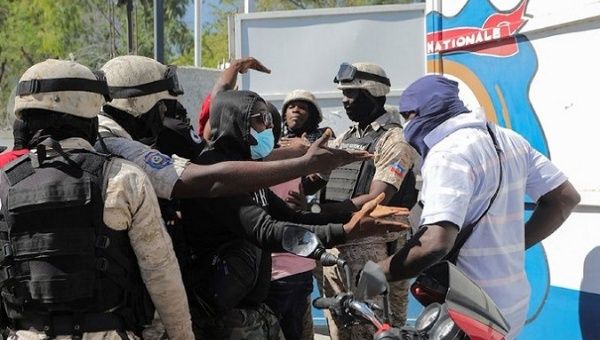 Police officers in uniform and undercover, Port-au-Prince, Haiti, 2023.