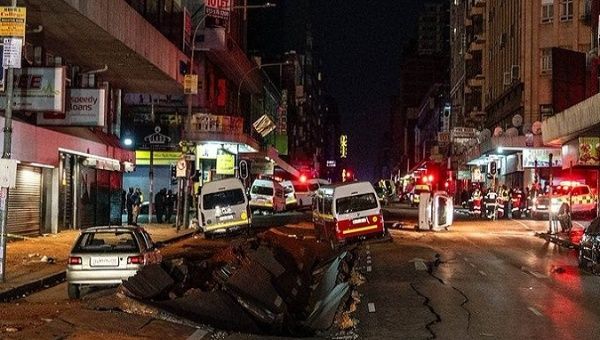 Gas explosion ripped open roads and flipped vehicles in the heart of South Africa's biggest city, Johannesburg. 