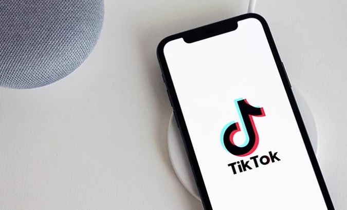 TikTok logo on a cell phone.