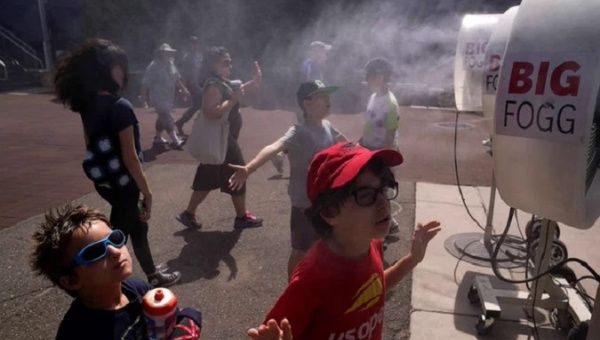 Children cool off in NYC, U.S., Sept. 2023.