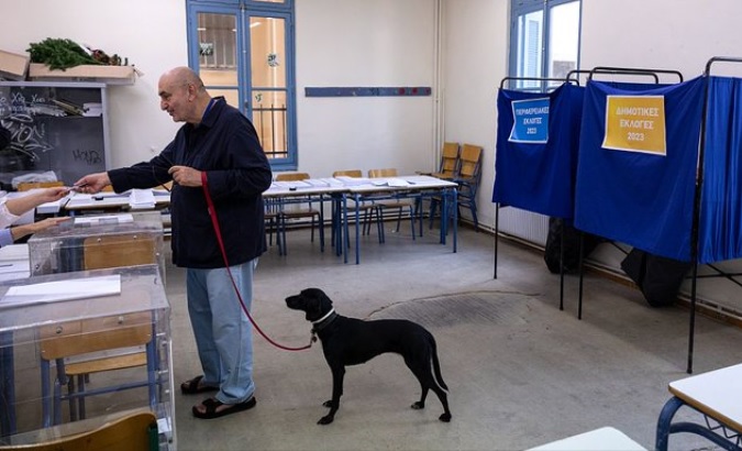 A citizen cast his vote in Greece, Oct. 8, 2023.