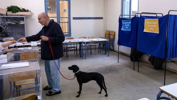 A citizen cast his vote in Greece, Oct. 8, 2023.