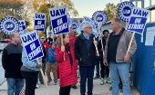 Wisconsin Governor Tony Evers (C) and UAW workers, Oct. 21, 2023.