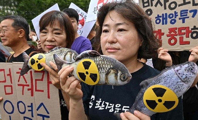 People protest against the dumping of nuclear water in the Pacific Ocean, 2023.