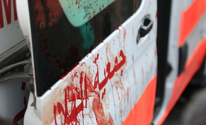 Blood spilled on the door of an ambulance in Gaza.