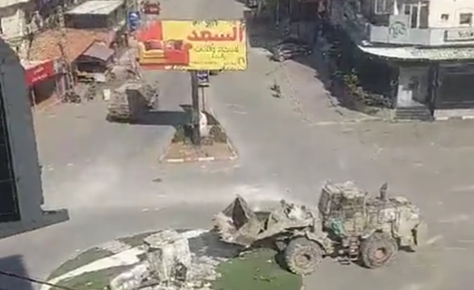 Israeli excavators destroying a roundabout in Jenin, West Bank, Nov. 9, 2023.