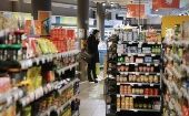 A customer shops at a supermarket in Brussels, Belgium, Nov. 15, 2023. 