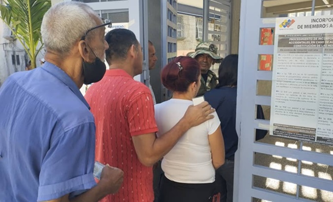 Citizens go to an electoral precinct in Carapita, Caracas, Venezuela, Dec. 3, 2023.