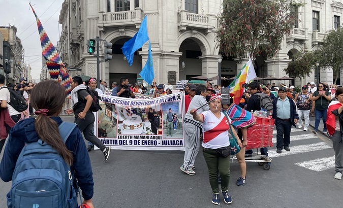 Relatives of the victims of repression march on the anniversary of Pedro Castillo's arrest, Lima, Dec. 7, 2023.