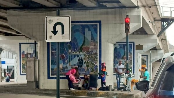 Street vendors under a bridge in Guayaquil, Ecuador, 2023.