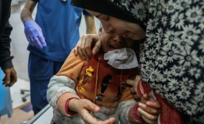 A Palestinian child injured in an Israeli air attack in Gaza, Dec.19, 2023.