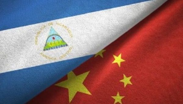 Flags of Nicaragua and China. 