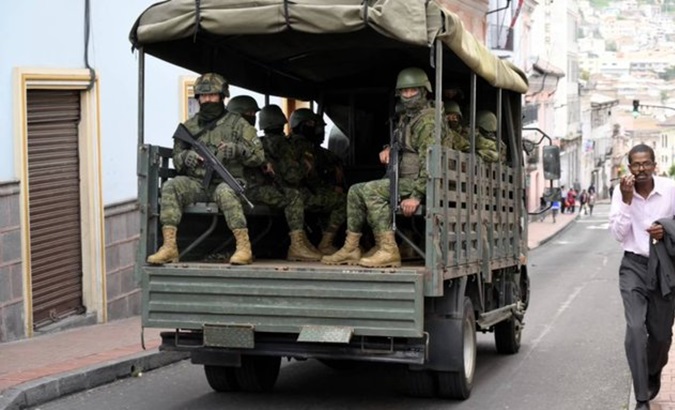 Ecuadorian military patrol the streets of downtown Quito, Jan. 10, 2024.