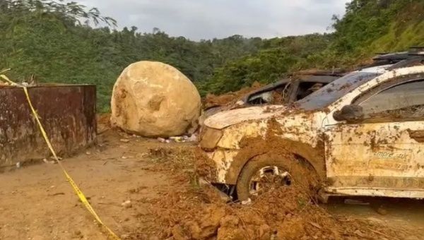 Cars buried by a landslide in the Choco Department, Colombia, Jan. 14, 2024.