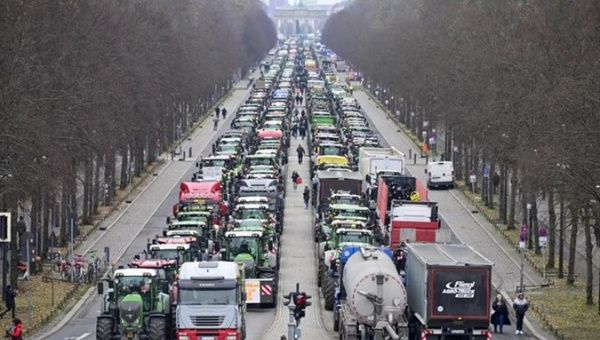 German farmers block traffic towards Berlin's Brandenburg Gate, Jan. 15, 2024.