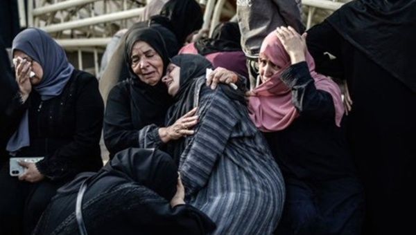 Palestinians are evacuated from Alkair Hospital in Khan Younis, Jan. 25, 2024.