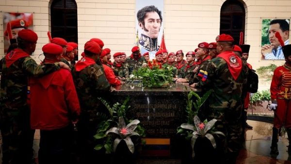 Venezuelan soldiers honor the late Commander Hugo Chavez, Feb. 4, 2024.