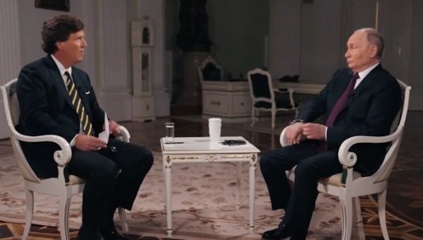 Tucker Carlson (L) and Russian President Vladimir Putin (R), Feb. 2024.