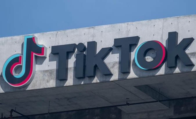 TikTok logo on the facade of a building.