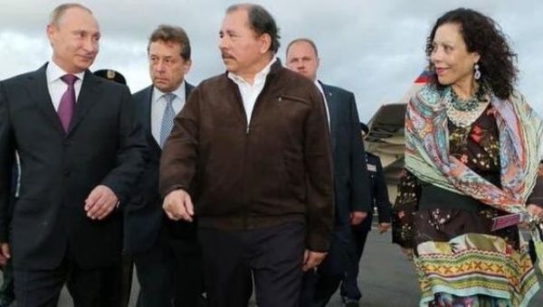 Putin (left) Daniel Ortega (center) and Rosario Murillo (right).