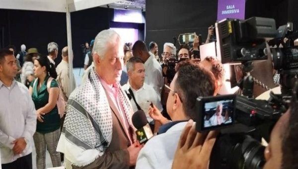 President Diaz-Cannel at the teleSUR stand, March 19, 2024