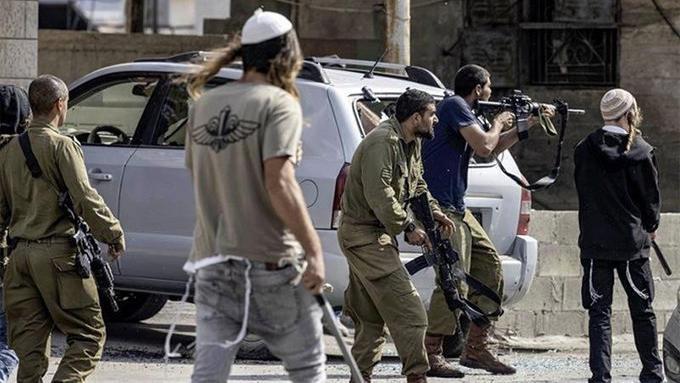 Israeli settlers attacking Palestinians with firearms, March 22, 2024