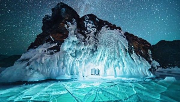 View of Baikal lake under a starry sky, 2021.