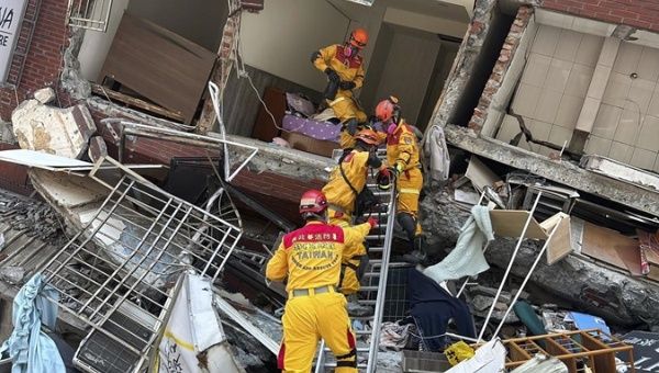 Rescuers search for earthquake victims in Hualien City, April 2, 2024.