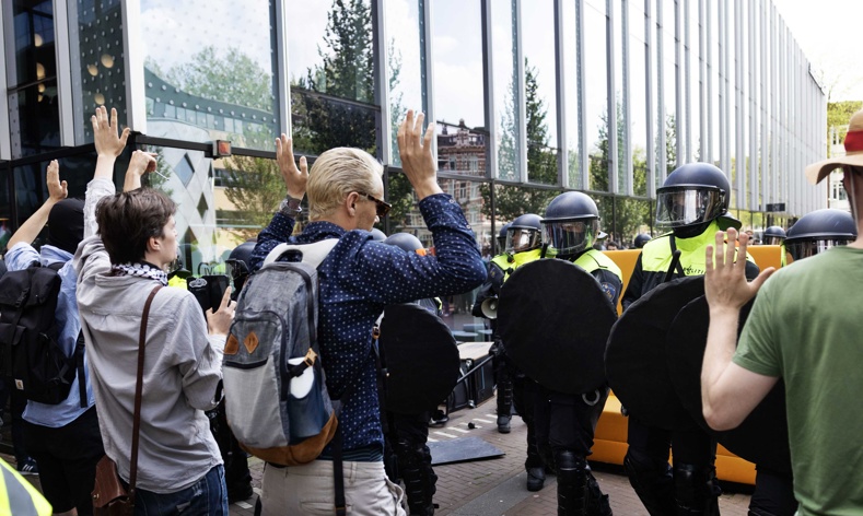 Teachers and Students protesting in fron of the police forces in Amsterdam, May 13, 2024