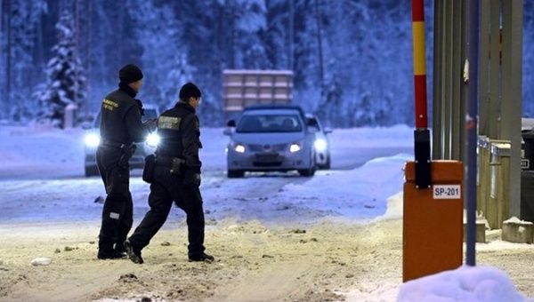 Guards at Vaalimaa border checkpoint in Virolahti, Finland, Dec. 2023.