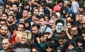Iranians accompany the funeral procession of President Ebrahim Raisi, May 21, 2024.