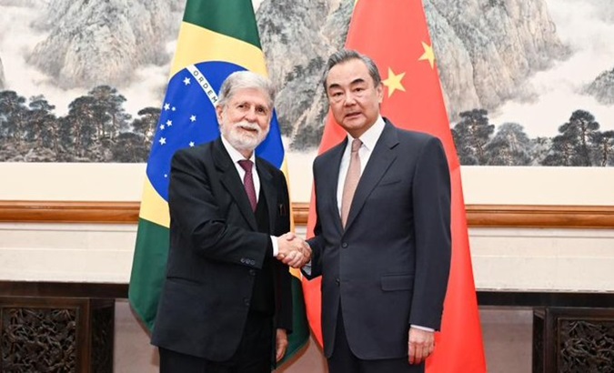 Brazilian Special Advisor Celso Amorim (L) & Chinese Foreign Affairs Minister Wang Yi (R), May 23, 2024.