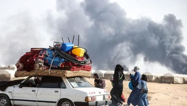 Palestinians flee refugee camps bombed by Israel, June, 2024.