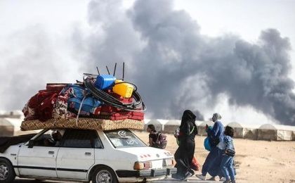 Palestinians flee refugee camps bombed by Israel, June, 2024.